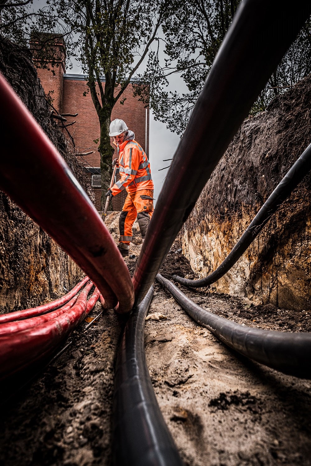 grondwerker aan het werk in Amsterdam